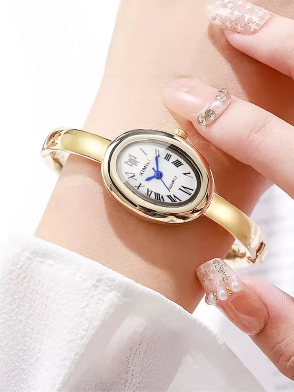 Elegant Gold-Tone Stainless Steel Bangle Watch - Picture 5 of 15